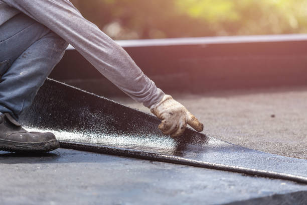 Professional Exterior Waterproofing technician working in Jasper, MI